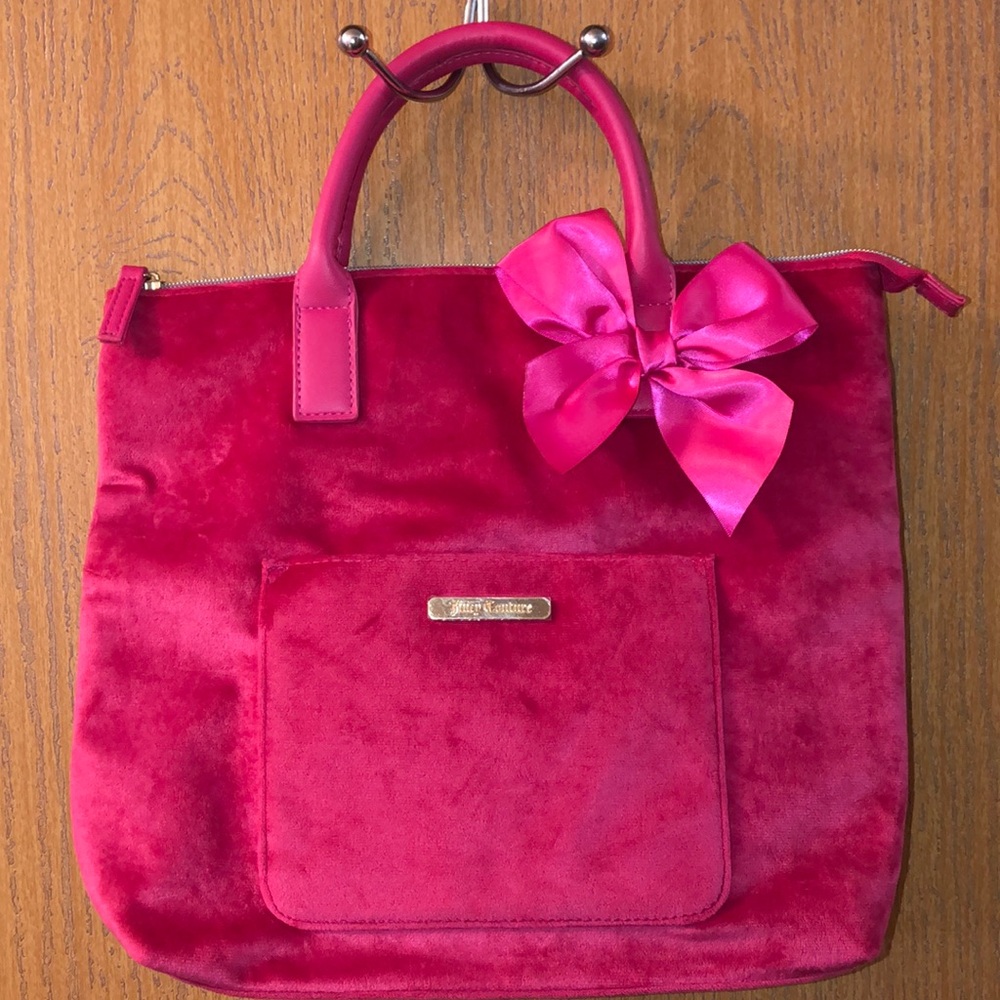 Juicy Couture pink velvet like tote with a pink bow.